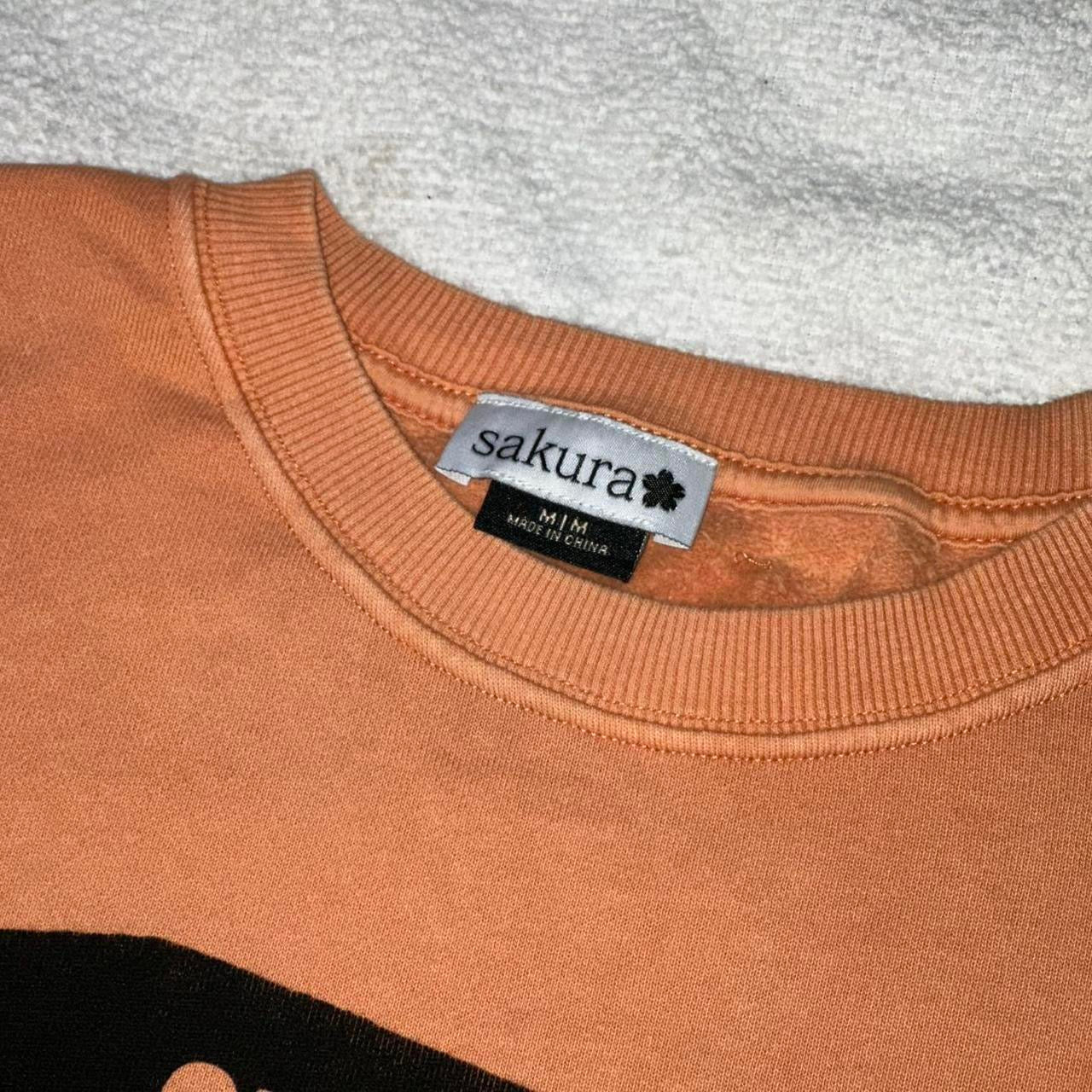 SMOKING CAUSES SWAG Jumper Coral