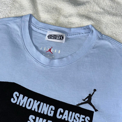 SMOKING CAUSES SWAG Jordan Tee